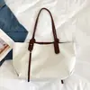 Bolsa de Tecido Grande Capacidade Feminina 2026 Novo Estilo Tendência Versátil Bolsa de Ombro Única Toque de Luxo Bolsa Tote para Trabalho e Dia a Dia