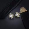 Brincos, Pingente, Colar e Anel de Trevo de Quatro Folhas para Influenciadores do TikTok e Kuaishou Conjunto de Três Peças Clássico Versátil Seleção Exquisite