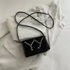 Versión coreana 2026 nueva moda tachonada con pedrería, textura única, lujo ligero, gran capacidad, bolso pequeño cuadrado simple para hombro y cruzado