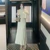 Conjunto feminino estilo francês outono 2026: blusa de manga longa com mangas afuniladas que marcam a cintura, vestido longo, conjunto de tricô de duas peças, elegante