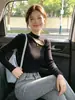 Suéter de Punto Hueco de Cuello Alto Nuevo Estilo Otoño 2026 para Mujer Delgado Elegante Versátil Top Base A14472
