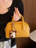 Bolsa cuadrada pequeña textura femenina sentido diagonal 2026 nuevo estilo verano atmosférica moderna simple un solo hombro cruzada tejida japonesa coreana