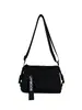 2026 Nuevo Material Impermeable de Moda Casual Versátil Tendencia Simple Pequeño Redondo Cubo Almohada Bolso Unisex Bolso para Viajero