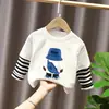 Camiseta base para niño 2026 nuevo modelo camiseta de manga larga a rayas patchwork para niños top de algodón puro otoño para niños mayores