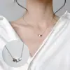 Collar de amor sencillo de estilo japonés y coreano, cadena de clavícula con astas cruzadas, flor, perla y colgante de latido de corazón de celebridad cibernética.