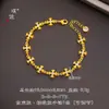 Pulsera de trébol de cuatro hojas y flor de iris enchapada en oro y con incrustaciones de diamantes, de alta retención de color, pulsera de diseño de nicho de alta gama para mujer estilo chino
