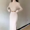 Vestido de punto liso de cuello alto para mujer, nuevo estilo coreano otoño e invierno 2025, elegante, adelgazante, casual, ajustado, con abertura, vestido largo