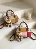 2026 Bolso Boston de Bloques de Color Retro Otoño Invierno Bolso de Mano de Alto Valor Bolso Cruzado de Hombro Único para Mujer