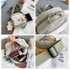 Bolso de hombro para mujer, nuevo, al por mayor, para hombres y mujeres, lindo bolso de mensajero tipo mochila de dibujos animados retro de moda con colgante.