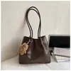 Bolsa Tote Grande Capacidade Retrô Feminina 2026 Nova Casual para o Dia a Dia Bolsa de Ombro Único Moda Mais Vendida Bolsa de Axila Transfronteiriça