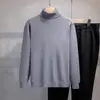 Suéter casual de punto para otoño e invierno con cuello alto apilado, nueva colección de punto al por mayor, top cálido de capa base de cuello alto, ropa para hombre transfronteriza