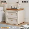 Mesita de Noche de Segunda Mano para Dormitorio del Hogar 2026 Venta Caliente Color Crema Lujo Ligero Gama Alta Madera Maciza Pequeño Armario de Almacenamiento de Mesita de Noche
