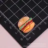 Juguete de caramelo caricatura 3D pan resina accesorios DIY pegamento de crema funda de teléfono hecha a mano Crocs accesorios para el cabello llavero