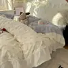 Conjunto de quatro peças de renda francesa seguro para bebês Classe A, estilo princesa ins, conjunto de três peças de algodão lavado floral fresco para dormitório