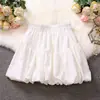 Falda Bute de Flor Negra Pequeña para Mujer Verano Versátil Cintura Alta Adelgazante Línea A Plisada Voluminosa Ropa Exterior