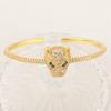 Pulsera de personalidad exagerada animal con cabeza de leopardo de ojos verdes, estilo ins europeo y americano, retro, chapada en cobre liso, 18K, para mujer