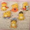 Dinossauro pequeno legal e bonito amarelo acessórios de resina diy atacado capa de celular adesivo de geladeira acessórios de cabelo pacote de material para presilha