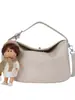 Bolso de mujer 2026 modelo nuevo, bolso tejido de un solo hombro cruzado, bolso cuadrado pequeño elegante, versión coreana de moda, bolso versátil para debajo del brazo con un ambiente elegante