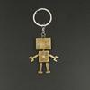 Llavero retro de robot de cartón plateado con forma de humano, colgante de llave de metal con grabado de Aleng Little Man, regalo