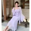 Elegante vestido de tirantes de encaje resistente estilo resort costero para mujer con chaqueta cárdigan protectora del sol, conjunto de dos piezas de moda, puro y seductor