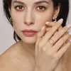 Anillo Enigma Li Color Hueco Diamante Super Brillante CNC Circonita Apertura Lateral Ajustable Color Acero Inoxidable Resistente Anillo para Dedo Femenino