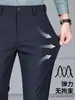Nuevos pantalones casuales de pierna recta para hombre para primavera y otoño, resistentes a las arrugas, pantalones de traje de negocios sin planchado, pantalones largos para hombre para el trabajo