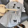 Conjunto Esportivo Casual de Shorts de Manga Curta com Estampa de Rosto Sorridente Transfronteiriço Feminino Emagrecedor Solto Estilo Coreano Conjunto de Duas Peças Estudante Tendência