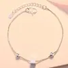 Comercio exterior europeo y americano joyería de moda nueva de verano todo partido popular caliente pulsera dulce para mujer tobillera de cruz simple