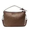 Bolsa de Mão Pequena Trançada Fashion para Mulheres 2026 Nova Bolsa de Ombro Transversal Versátil Vintage de Alto Padrão para o Dia a Dia Tendência