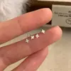 Pendientes de Estrella de Cuatro Puntas de Plata Pura S999 Estilo Coreano Minimalista Estilo Fresco Estrella Exquisitos Moda Versátiles Pendientes de Diseño para el Viaje