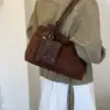 Bolsa tote de moda casual de ombro único grande capacidade 2026 versátil para o trabalho outono camurça nova bolsa simples feminina estilo coreano