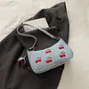 Bolso bandolera estampado de moda al por mayor, bolso de mano versátil con diseño de nicho, bolso de mujer con forma de media luna, bolso de hombro de marca de lujo ligero y moderno