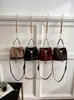 Bolso Cubo de Moda Estilo Retro para Mujer 2026 Nuevo Bolso de Mano con Patrón de Diamantes Simple para Viajes Cotidianos Salidas de Moda Bolso Pequeño para Llevar Todo