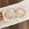 Popular juego de pulseras ovaladas geométricas acrílicas transfronterizas europeas y americanas, diseño único, joyería versátil para mujer