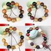 Pulsera de cuentas de Buda juego de texto rosario joyería de madera sándalo pulsera de cuentas de Buda para hombres y mujeres sándalo rojo negro pera amarilla fabricantes venta al por mayor