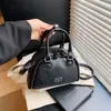 Bolsa de Bolos de Nicho para Mujer 2026 Nueva Elegante Bolso de Mano Pequeño Versátil Diseño Casual Bolso de Hombro Único Cruzado