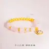 Tienda de Oro Mismo Estilo Pulsera Labubu de Cristal Rosa Natural Oro Arena Accesorios DIY Pulsera de Cuentas de Cristal Doradas Hecha a Mano