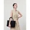 Vestido Largo de Verano 2026 Estilo Minimalista Cuello Alto Botones Diagonales Sin Mangas Ceñido a la Cintura Fuente Directa Distribución Dropshipping