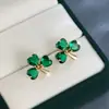 Pendientes de Trébol Esmeralda Cruzados Tang Jia para Mujer Pendiente Dorado de Lujo Ligero Pequeño Nicho Sensación de Alta Gama
