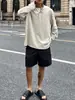 Sudadera para hombre con textura plisada de botones, camiseta de manga larga, elegante y casual, estilo Issey Miyake Henry, primavera/otoño 2025, corte holgado con cuello de tapeta frontal