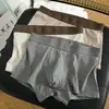Fábrica de origen algodón ropa interior para hombre calzoncillos bóxer para hombre deportivos de alta gama pantalones cortos de cuatro esquinas generación explosiva sonido tembloroso