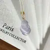 Colgante de calabaza de piedra ojo de gato al por mayor del fabricante, colgante de collar de cabeza de gato de ojo de gato rosa, popular en Xiaohongshu, jade de venta caliente en áreas escénicas
