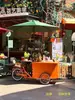 Carrito de venta móvil para exteriores, triciclo de puesto móvil, popular carrito de comida con asiento invertido, vehículo de exhibición para promoción de alimentos