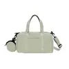 Bolsa de Ombro de Nylon Modelo Novo Transfronteiriço Primavera 2026 Bolsa de Mão Quadrada Pequena Fashion Casual Bolsa Simples de Cor Sólida para o Dia a Dia