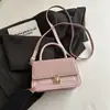 Bolsa quadrada pequena de trama 2026 nova bolsa de ombro moderna bolsa simples feminina pequena bolsa de mão bolsa feminina de comércio exterior bolsa transversal