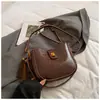 Bolso de Axila de Aspecto Retro de Alta Calidad para Mujer 2025 Nuevo Bolso Cubo Simple Textura de Nicho Hombro Único Cruzado Bolso para Teléfono Móvil