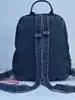 Mini mochila acolchada de mezclilla desgastada para señoritas, diseño coreano, adecuada para ir de compras y salidas, creando una atmósfera elegante.
