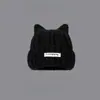 Nuevo Sombrero de Orejas de Gato para Mujer en Otoño e Invierno Estilo Coreano Lindo Cálido Protección para Orejas Cara Pequeña Tejido de Lana Frío Sombrero Venta al por Mayor