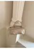 Bolso de Axila de Nicho Transfronterizo para Mujer 2026 Nuevo Bolso de Mano de Moda Vintage Bolso de Hombro Versátil Bolso Cruzado para Viajes Diarios de Moda