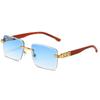 Gafas de sol de montura pequeña con grano de madera de nuevo estilo, personalizadas con cabeza de leopardo decorativa, gafas sin montura, moda para hombres y mujeres, gafas de sol transfronterizas europeas y americanas